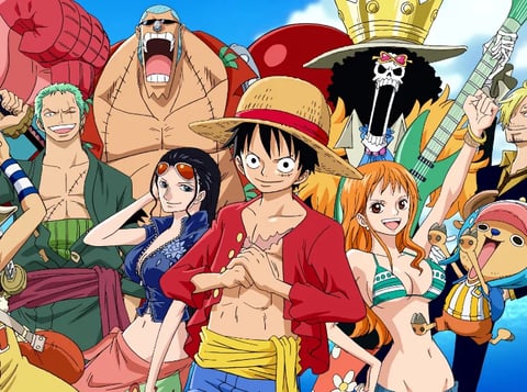 Colorful anime illustration featuring diverse characters from One Piece including a pirate captain and crew members against a bright blue sky background